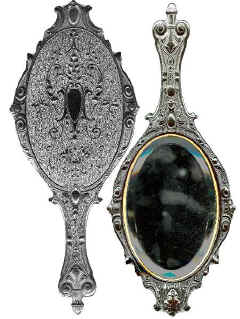 Hand Mirror, Very glossy and black. Heavier than the Shellac mirrors.