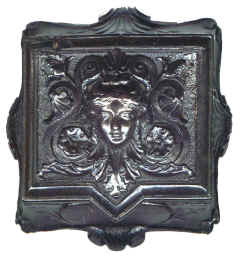 Match Holder. The interior is curved and there is a rough oval shaped panel on the front for striking the matches.