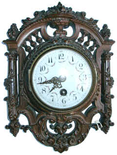 Clock. This piece, with a barometer replacing the clock, sometimes forms the lower part of Barometer/Thermometer pairing.